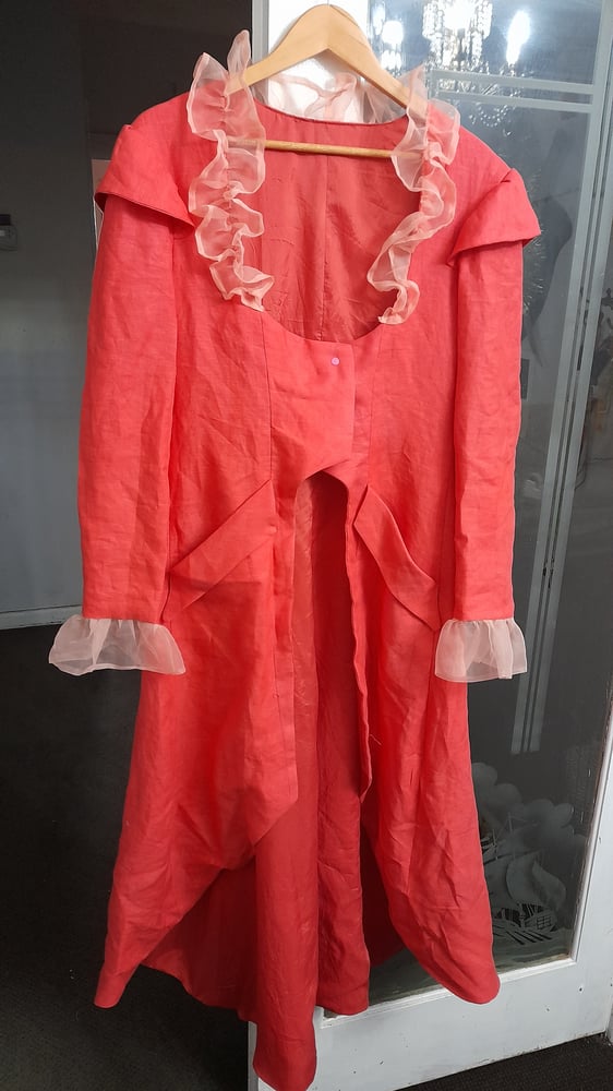 Image of bright orange steampunk coat