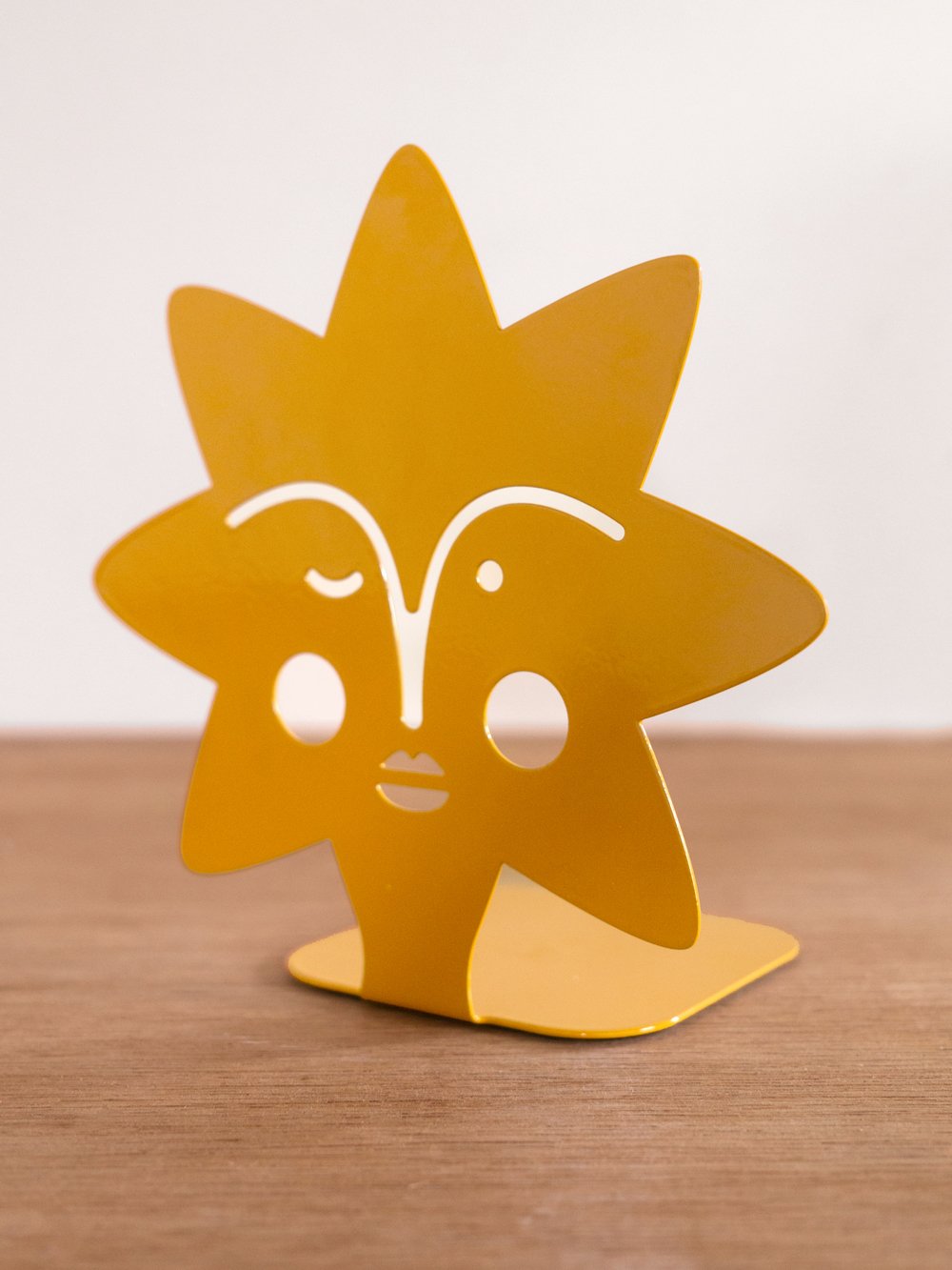 Image of sun shaped bookend