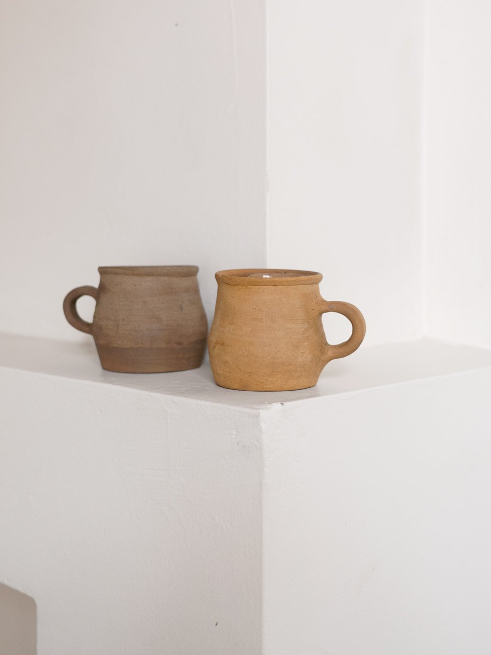 Image of primitive mugs