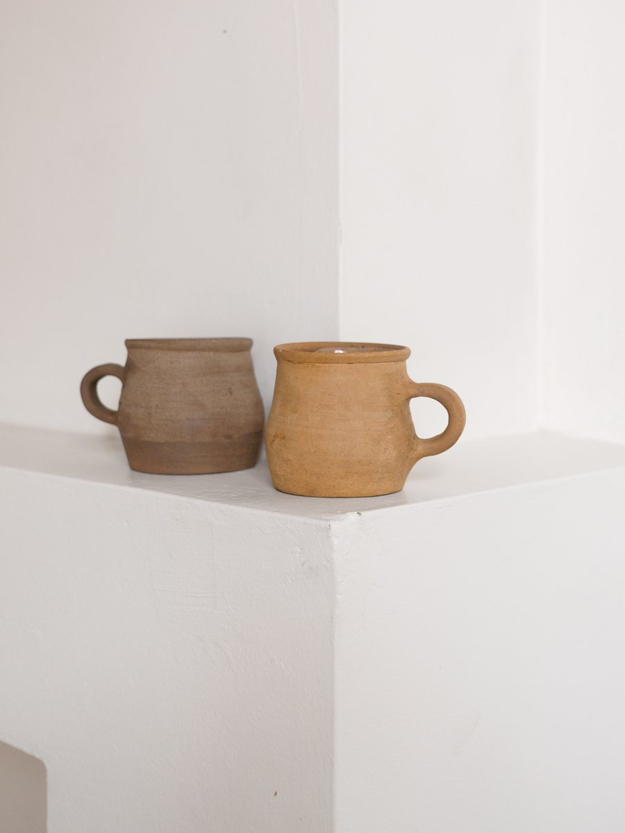 Image of primitive mugs