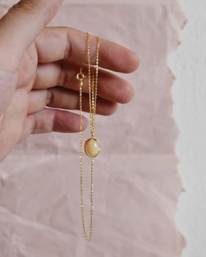 Image of Fire Opal cabochon oval shape 14k gold necklace