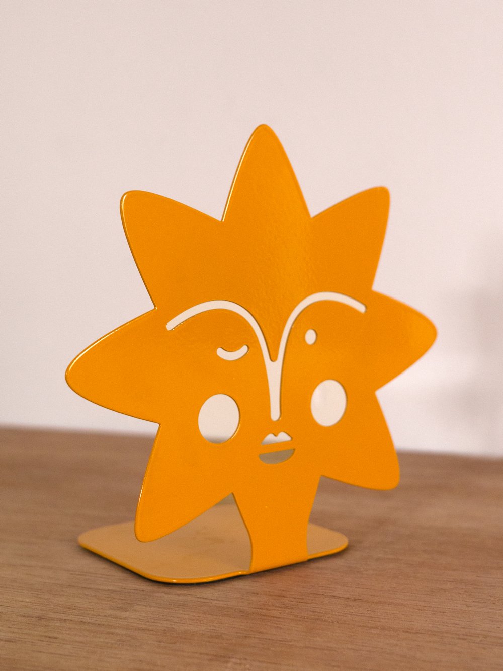 Image of sun shaped bookend
