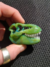 Image 3 of Green energy Tyrannosaurus Rex skull pendant. 