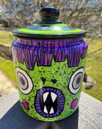 Image 1 of Small Green Two Faced Jar