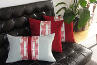 Image 3 of 'Vertical Integrity' red velvet cushion