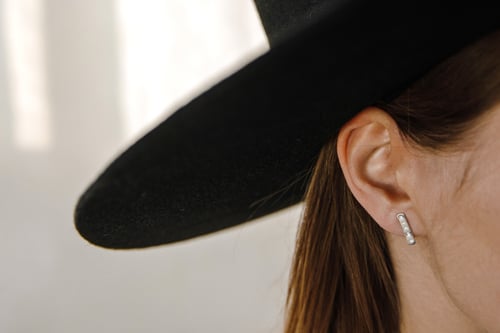 Image of Middle silver earrings with inscription in Latin