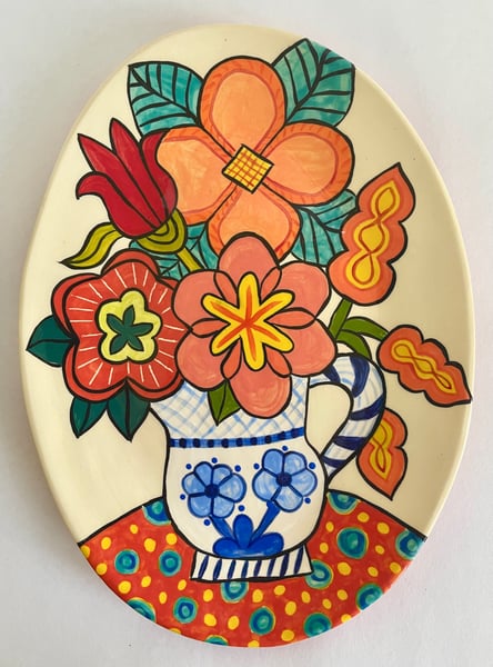 Image of 158 Medium Platter with Red, Orange, Pink Flowers, Blue and White Vase, Dotted Tablecloth