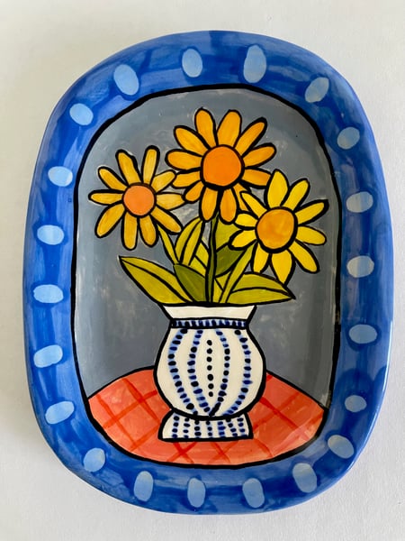 Image of 168 Small Platter with Blue Border, Sunflowers, Vase and Red Tablecloth