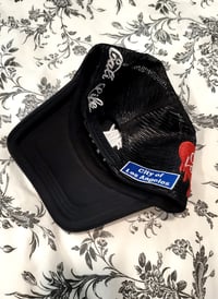 Image 3 of Los Angeles paint drip trucker hat
