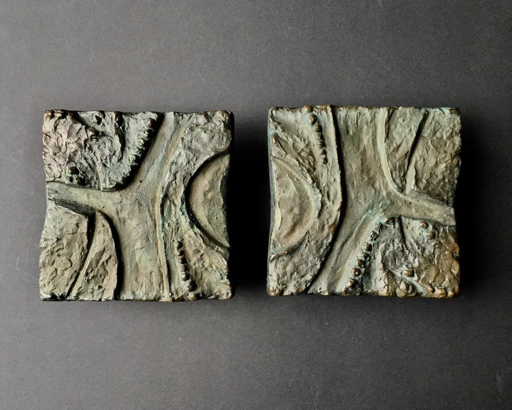 Image of Set of two Bronze Handles with Abstract Relief