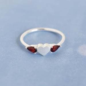 Image of La Petite Garnet Heart pear cut silver ring