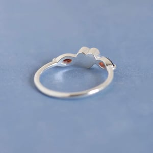 Image of La Petite Garnet Heart marquise cut silver ring