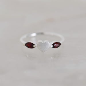 Image of La Petite Garnet Heart marquise cut silver ring