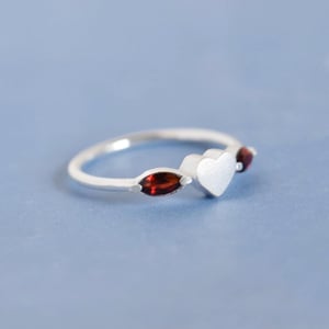 Image of La Petite Garnet Heart marquise cut silver ring