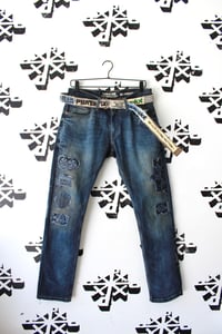 Image of rugged not ripped denim jeans 