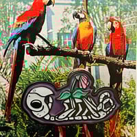 Image 2 of An EX-PARROT Glow-in-the-Dark 1.75" Enamel Pin