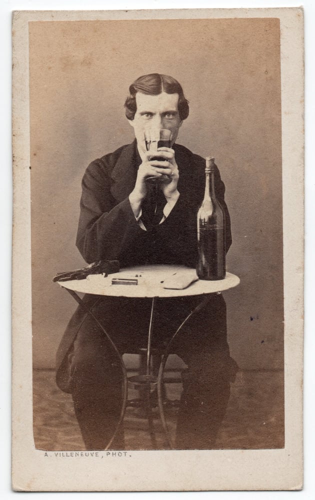 Image of A. Villeneuve: man with strong gaze drinking wine, ca. 1865