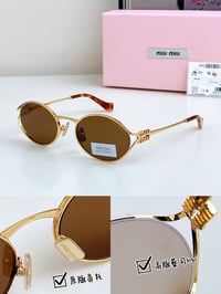 Miümiu Oval Sunglasses
