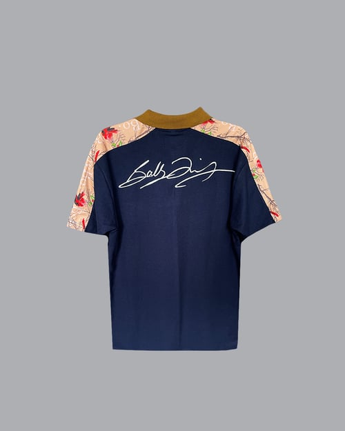 Image of The Red Bird Polo in Midnight Blue