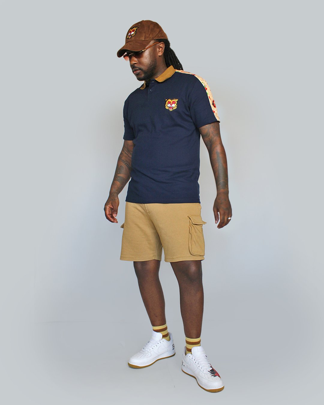 Image of The Red Bird Polo in Midnight Blue