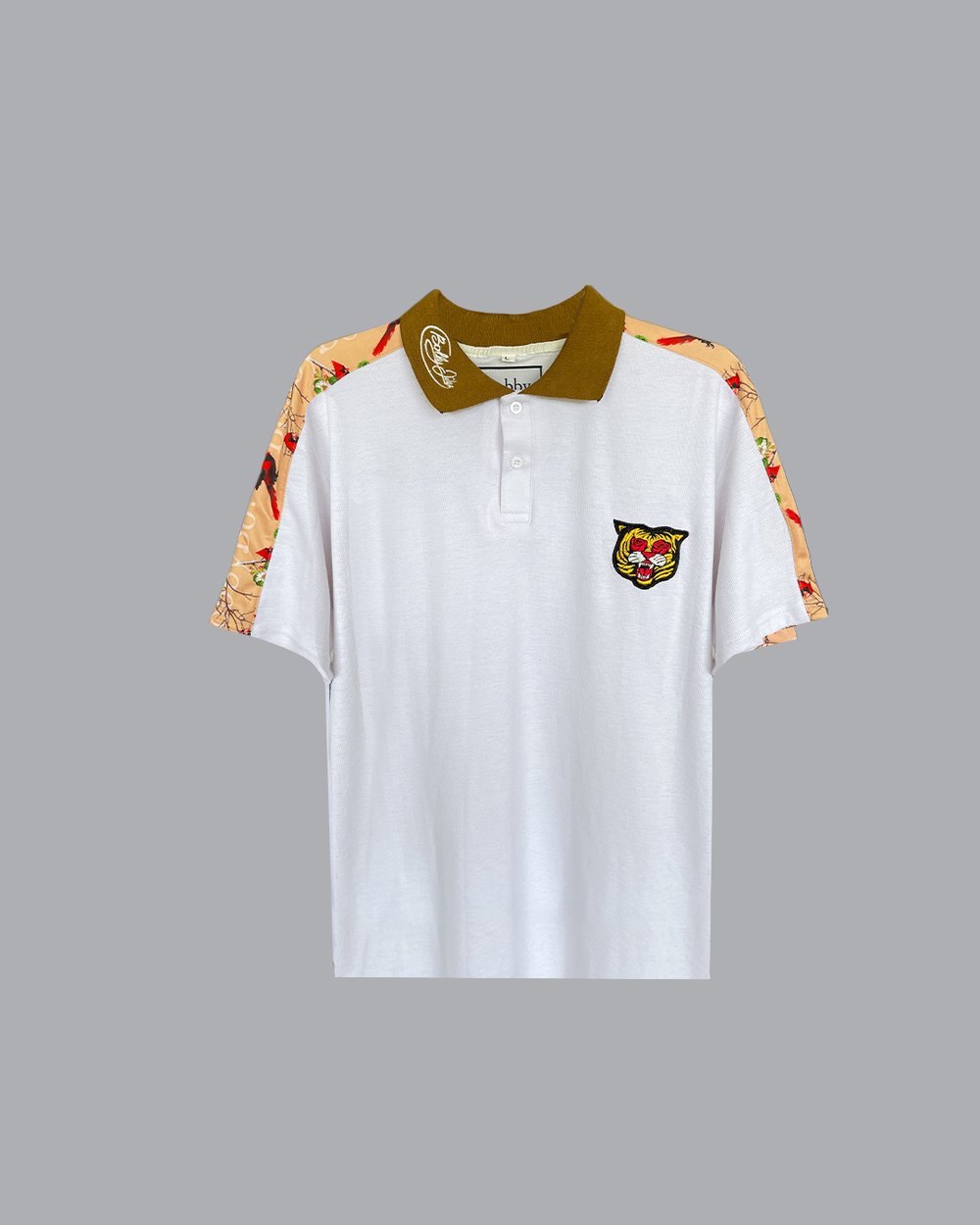 Image of The Red Bird Polo in White