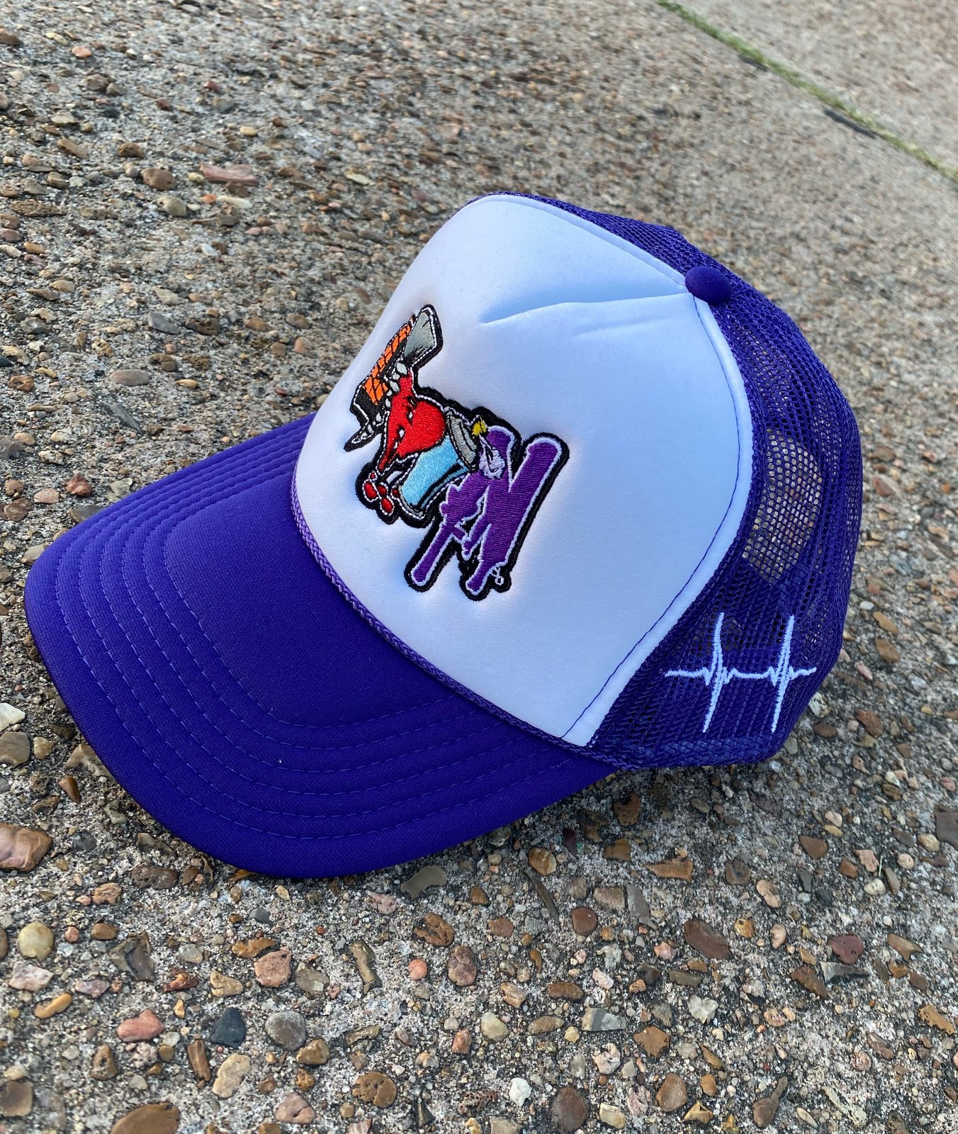 white and purple hat