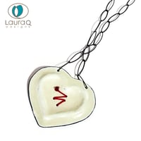 Image 2 of a mended GREEN & CREAM heart