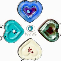 Image 4 of a mended GREEN & CREAM heart