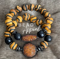 Image 1 of Tibetan Orange