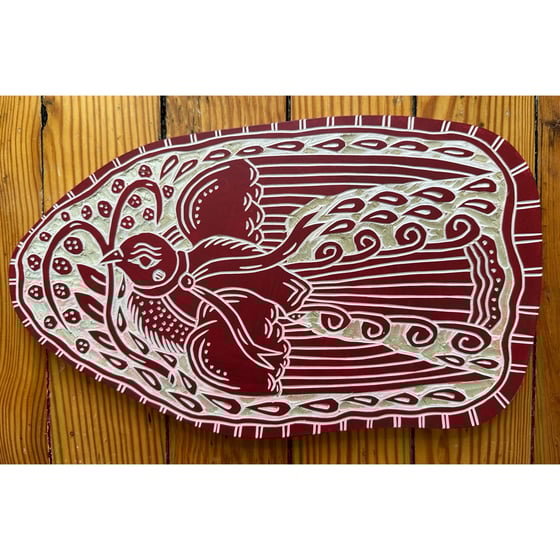 Image of Deep Red Curly Tail Bird