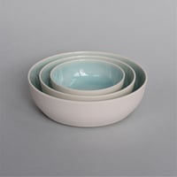 Image 1 of Small nest of 3 shallow dishes with ice green interior