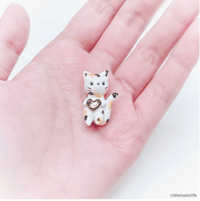 Image 1 of calico cat figurine