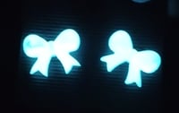 Image 1 of Pearl White Glow Bow Studs