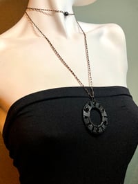 Image 5 of Circle Pendant on Black & Brass Chain