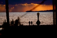 "Lovers on the beach at sunset" 