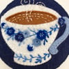 blue and white teacup pincushion