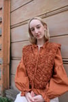 Dryden Vest (Merino Wool in colour rust)