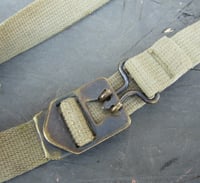 Image 2 of WWII Era Khaki/Tan shade M1 Helmet chin straps. Original. brass buckle.