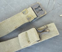 Image 4 of WWII Era Khaki/Tan shade M1 Helmet chin straps. Original. brass buckle.