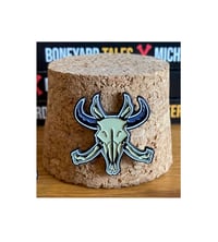Official Boneyard Tales bison skull & cross-ribs pin