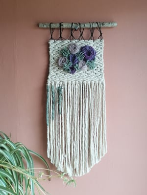 Floral embroidered weave in purples and sage green 