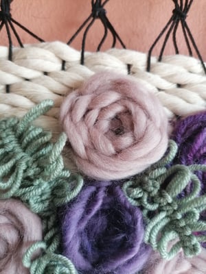 Floral embroidered weave in purples and sage green 