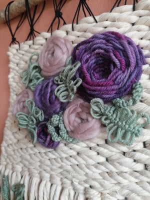 Floral embroidered weave in purples and sage green 