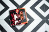 Rouge Carpet Disaster Cassette (Translucent Bright  Orange)