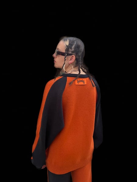 Image of stricksweater orange/black