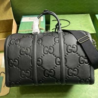 Image 1 of GG duffles 