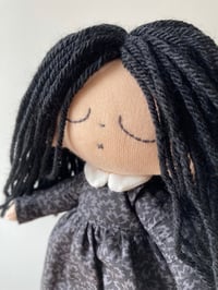 Image 2 of Wednesday Addams doll.