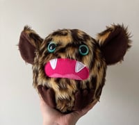 Image 1 of medium leopard print monster plushie