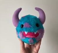 Image 1 of Small blue and lilac horned monster plushie