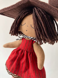 Image 2 of Red cabin doll.